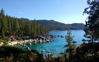 Beautiful blue waters of East Lake Tahoe, for Ellen Blazer's travel blog To Travel and Bloom