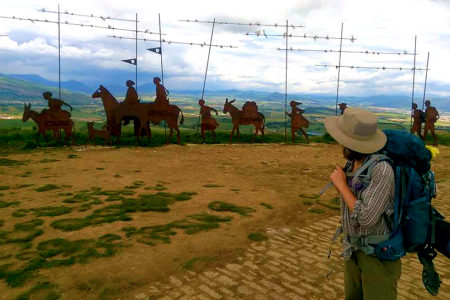 El Camino de Santiago Me hiking El Camino de Santiago at an overlook between Pamplona and Puente la Reina, for Ellen Blazer's travel blog To Travel and Bloom