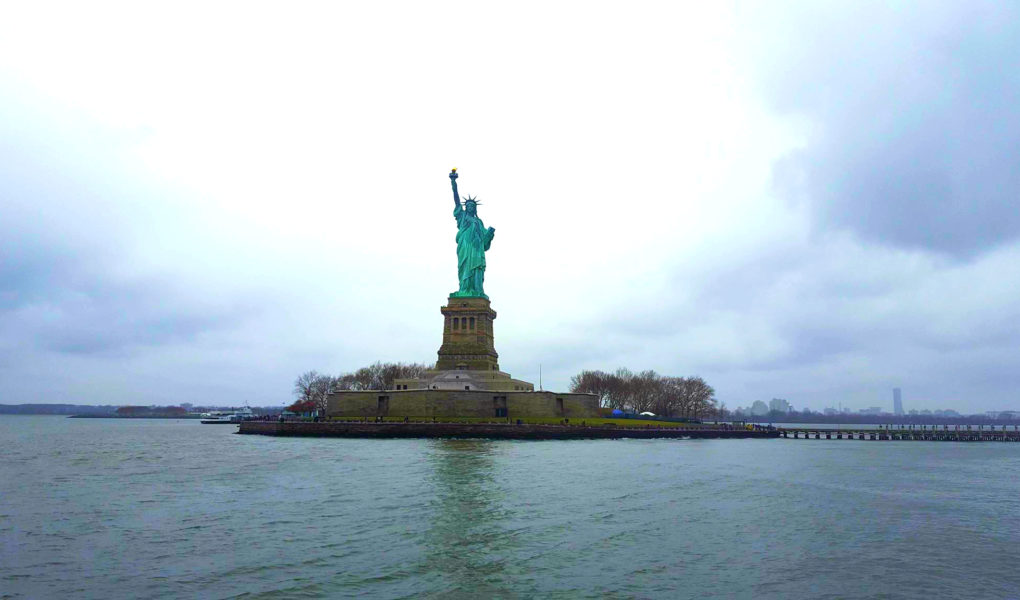 View of the Statue of Liberty from the ferry ride, for Ellen Blazer's travel blog To Travel and Bloom