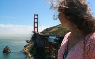 Me at the Golden Gate Bridge in San Francisco, California, for Ellen Blazer's travel blog To Travel and Bloom