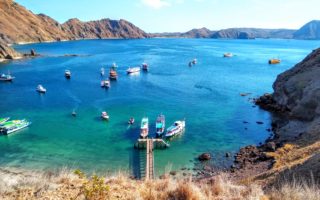 Boats docking at Padar Island in Komodo National Park of Labuan Bajo, Flores, Indonesia