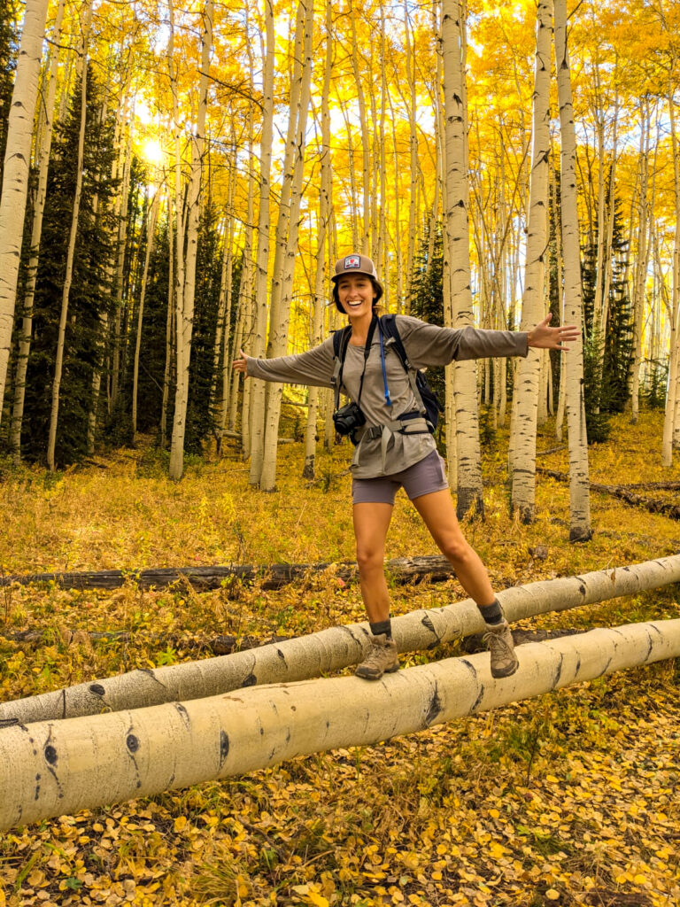 3 Best Places for Fall Colors in Crested Butte, Colorado Ellen Balancing on an Aspen 768x1024 - 3 Best Places for Fall Colors in Crested Butte, Colorado